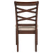 CoasterEveryday Barton 5-piece round wood dining table set with dark brown finish, including table and matching chairs.
