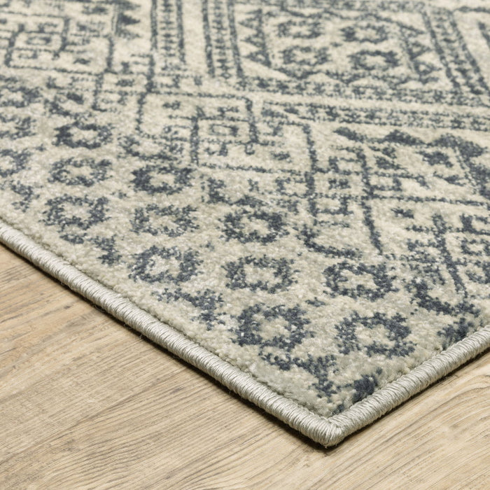 10' x 13' Geometric Power Loom Stain Resistant Area Rug - Blue And Beige