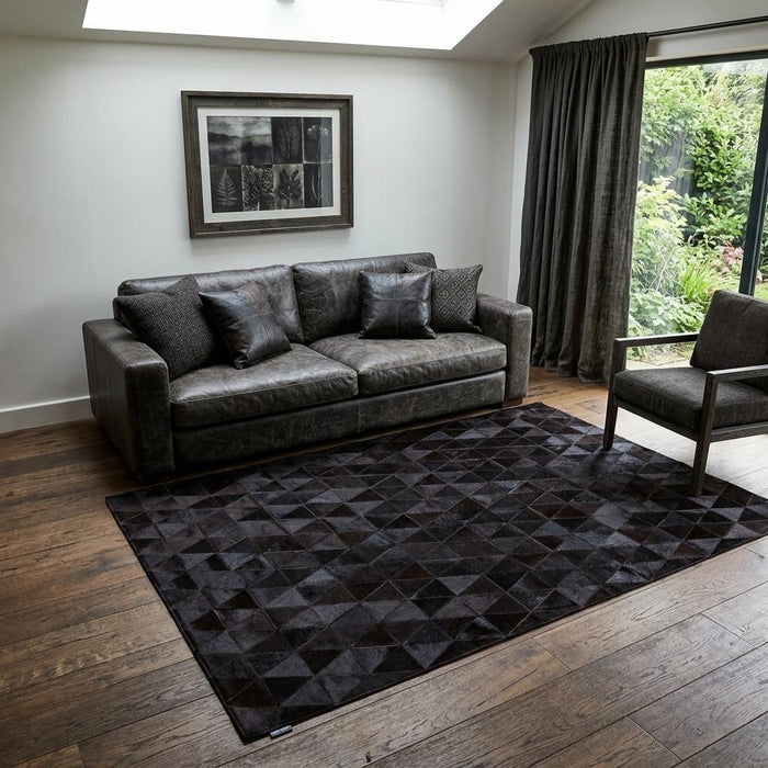 5' X 8' Cowhide Patchwork Area Rug (544497) - Black