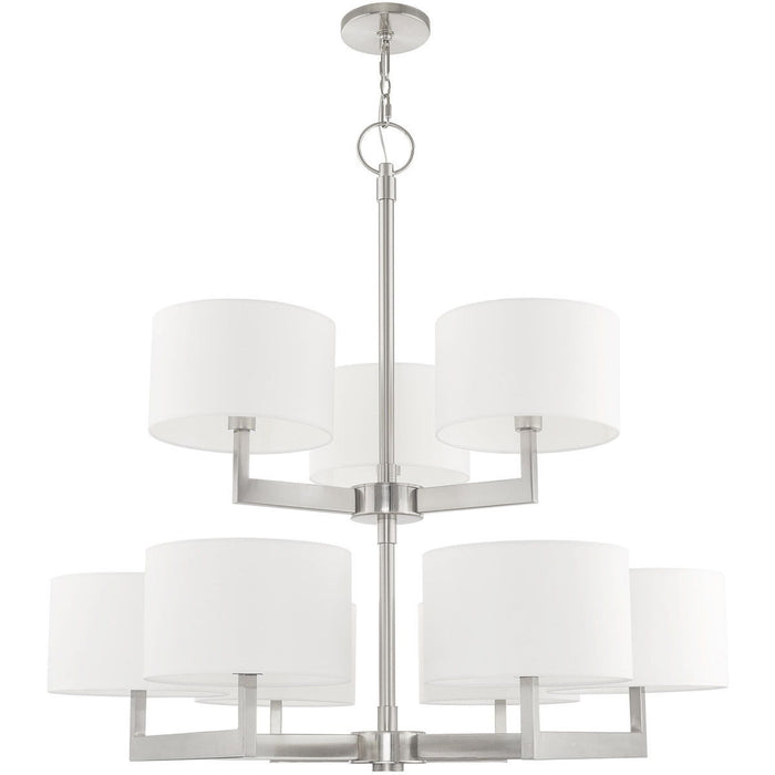 43-inch HomeRoots metal chandelier with nine dimmable lights, shades, nickel finish, and off-white accents.