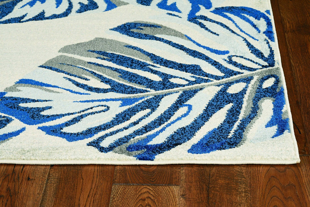 8' x 11' Machine Woven Oversized Tropical Leaves Indoor Area Rug - Gray Blue