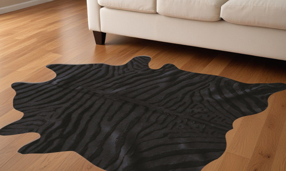 5' x 7' Hand Knotted Area Rug - Black Cowhide