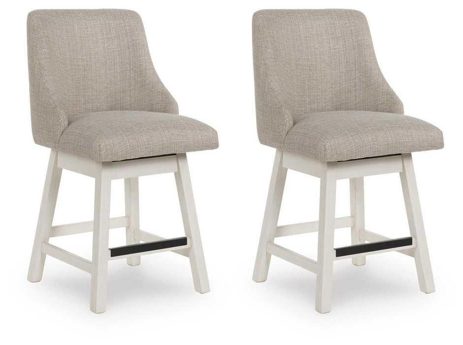 Set of two Robbinsdale Signature Design by Ashley® upholstered swivel curved back barstools in antique white with wooden legs.