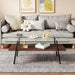Giga rectangular coffee table with tempered glass tabletop and metal legs, modern design for living room decor.