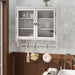 White washed Giga vintage double door wall medicine cabinet with three-tier storage and towel rack, ideal for bathroom organization.