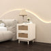 Giga antique natural rattan accent nightstand with two drawers and storage space, ideal for bedroom decor.