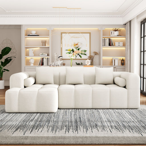 Giga sectional sofa with multiple seating sections and two side pockets, showcasing a modern stationary sectional design.