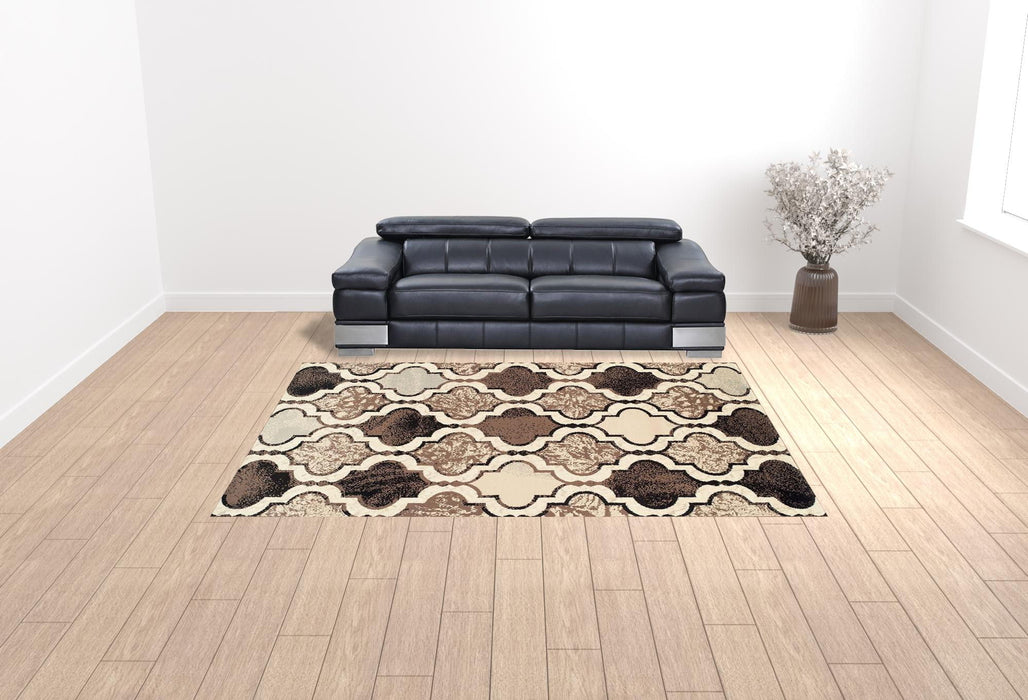 9' x 12' Quatrefoil Power Loom Distressed Stain Resistant Area Rug - Ivory