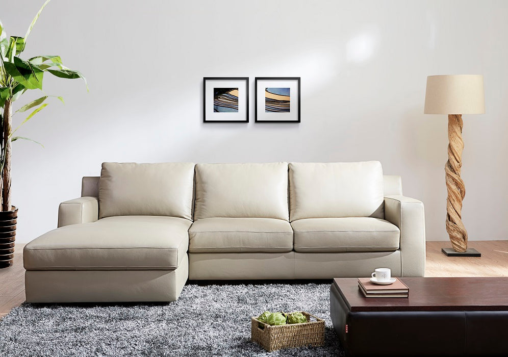 Jenny Premium Leather Sectional Sleeper in Beige In Right Or Left Hand Facing Chaise.