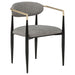 Pair of grey Bradbury fabric upholstered dining arm chairs by CoasterEveryday, shown in a modern furniture setting.
