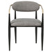Set of two CoasterEveryday Bradbury grey fabric upholstered dining arm chairs with wooden legs, shown in a modern dining room setting.