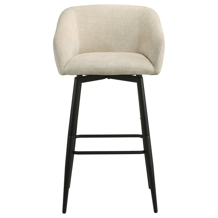Set of two CoasterEveryday Rainer fabric upholstered swivel bar chairs in cream with modern design and padded seats.