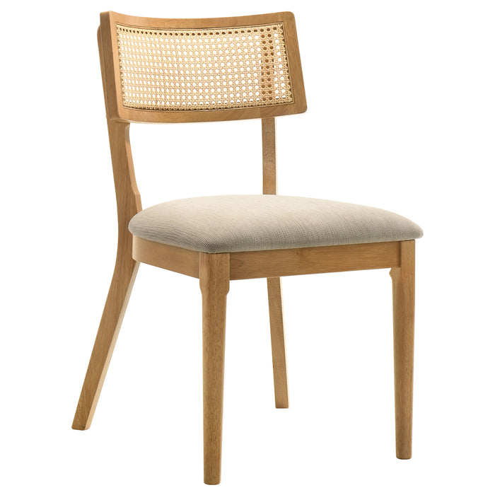 Set of two CoasterEveryday Fabra Cane Back Side Chairs in honey wheat with woven cane seats and curved backrests.