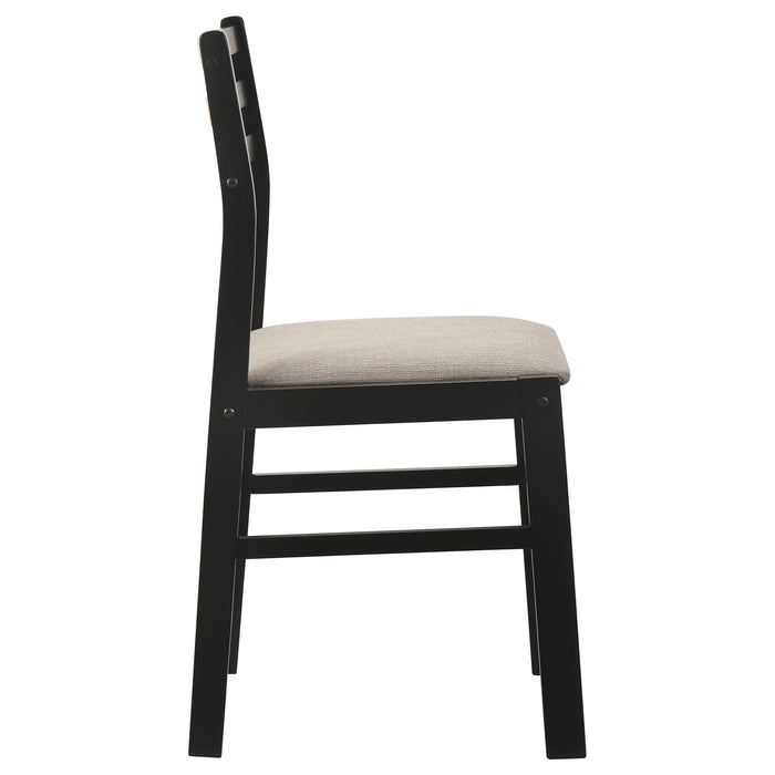 CoasterEveryday Sykes black ladder back side chairs with beige fabric upholstery, set of 2