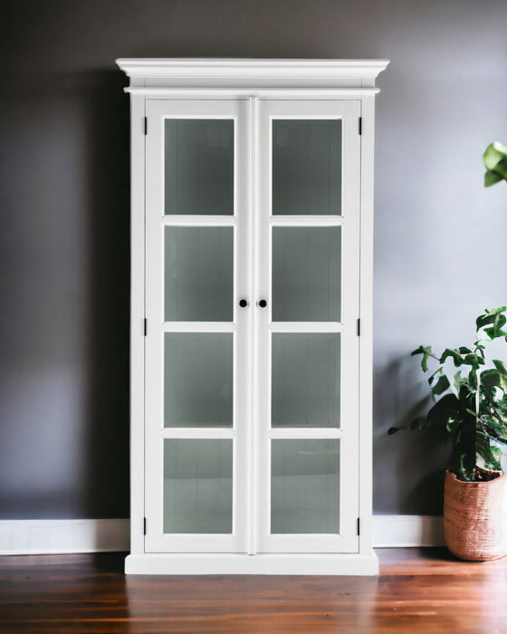 White wood and glass double door accent storage cabinet by HomeRoots with sleek design and interior shelving.