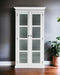 White wood and glass double door accent storage cabinet by HomeRoots with sleek design and interior shelving.