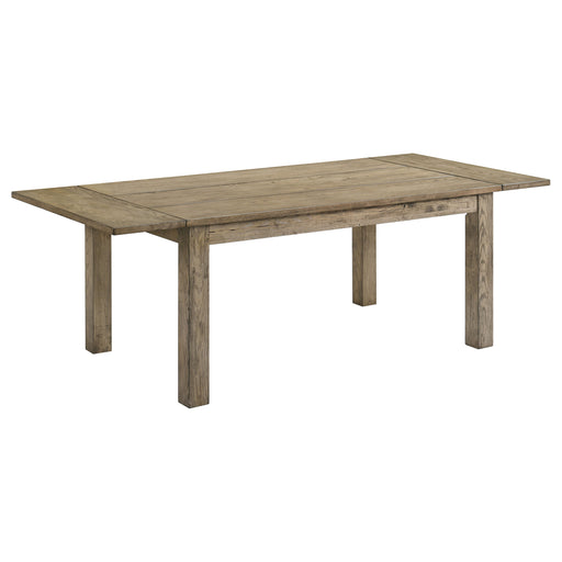 Solid wood Cardova 87-inch extension dining table in vineyard oak finish, with a natural wood grain surface and sturdy legs.
