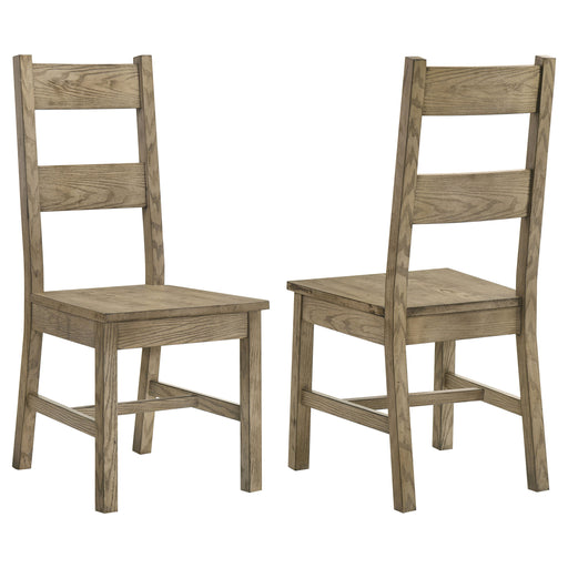 Set of two CoasterEveryday Cardova solid wood dining side chairs in Vineyard Oak with curved backrests and tapered legs.