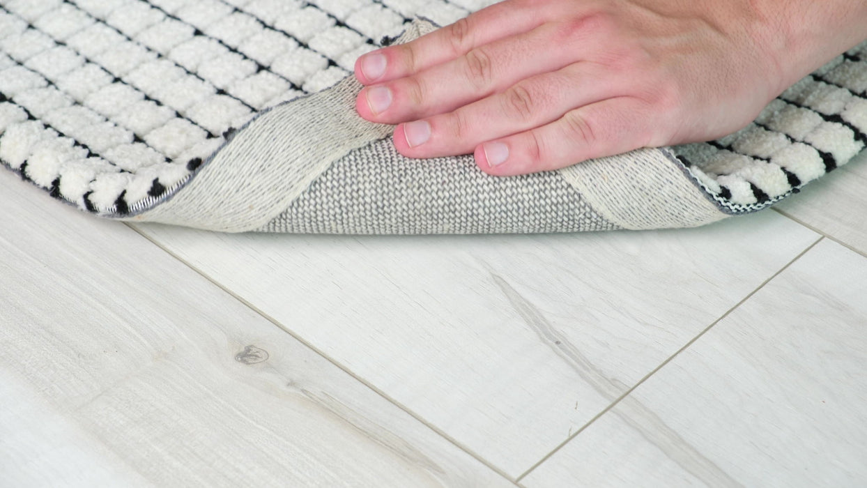 7' x 10' Checkered Power Loom Distressed Area Rug - Beige And Black