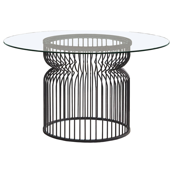 CoasterEveryday Granvia round 54-inch glass top metal dining table with gunmetal finish, showcasing modern furniture design.