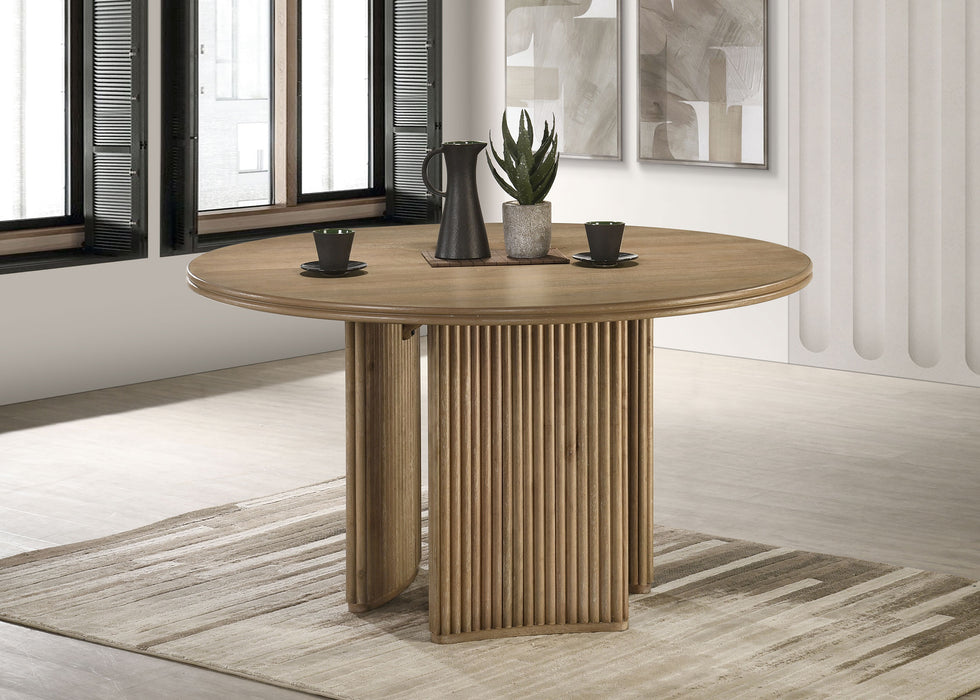 Round wood dining table by CoasterEveryday, 53-inch distressed light brown finish, with natural wood grain and sturdy legs.