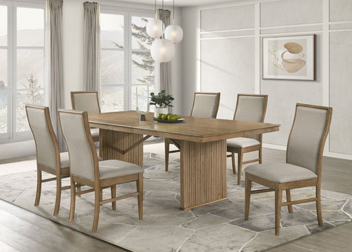 CoasterEveryday Adina 7-piece extension dining set in distressed light brown wood, with a table and matching chairs.