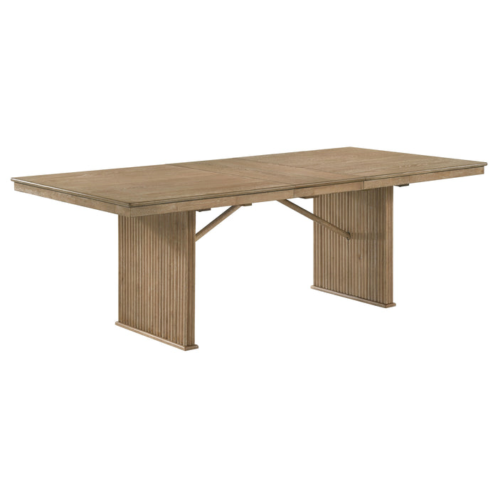 CoasterEveryday Adina 7-piece extension dining set with distressed light brown wood finish, featuring a table and matching chairs.