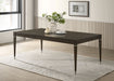Ash brown Reseda 81-inch extension leaf dining table by CoasterEveryday, showing the sturdy wooden surface and extendable design.