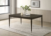 Ash brown Reseda 81-inch extension leaf dining table from CoasterEveryday, showing its smooth wooden surface and expandable design.