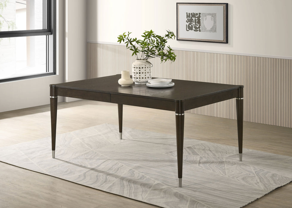 Ash brown Reseda 81-inch extension leaf dining table from CoasterEveryday, showing its smooth wooden surface and expandable design.