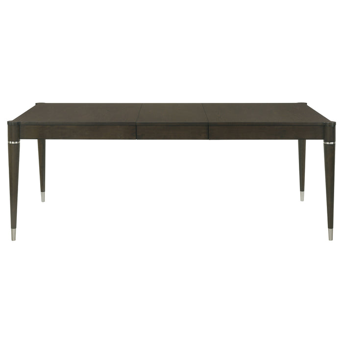 Ash brown Reseda 81-inch extension leaf dining table by CoasterEveryday, shown with extended leaves and sturdy wooden construction.