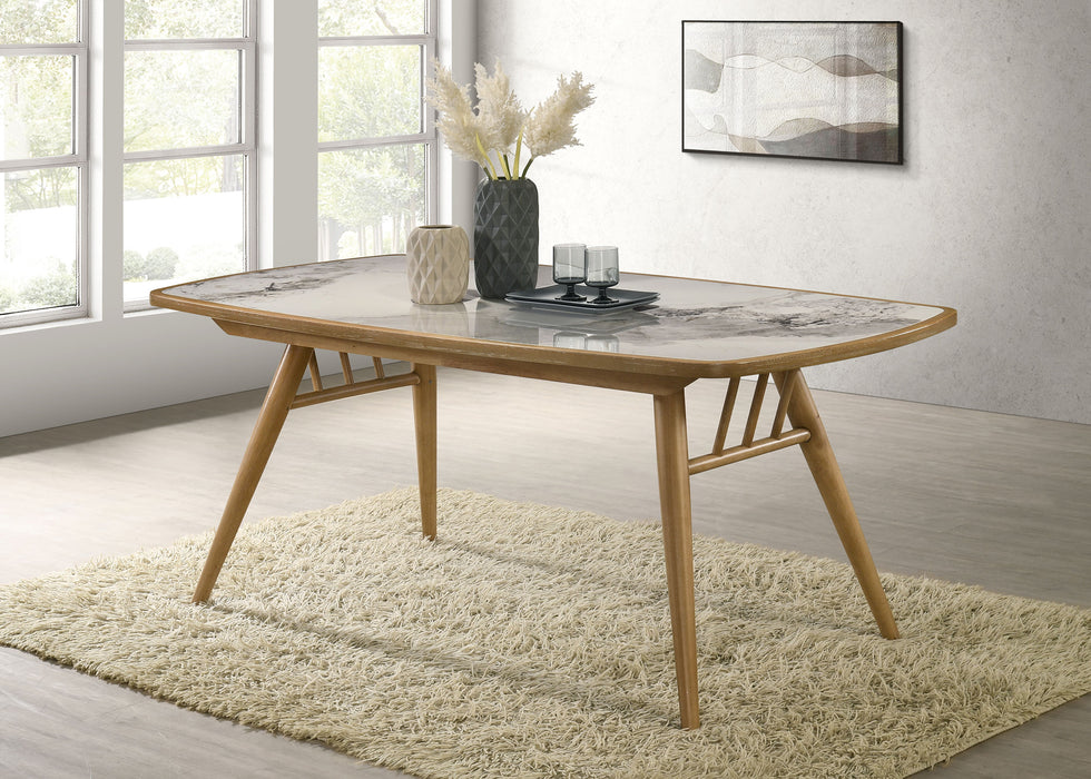 Weathered natural 73-inch rectangular dining table by CoasterEveryday, showcasing a sturdy wood furniture design.