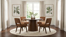 Round walnut veneer dining table by CoasterEveryday, 52-inch diameter with a smooth wood grain finish.