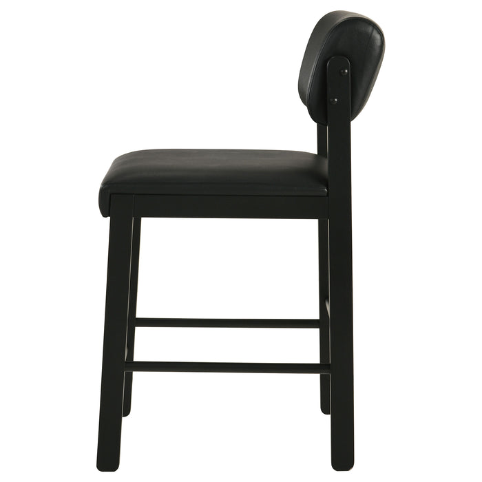 Two black Kehoe upholstered counter height chairs from CoasterEveryday with cushioned seats and backrests, set against a neutral background.