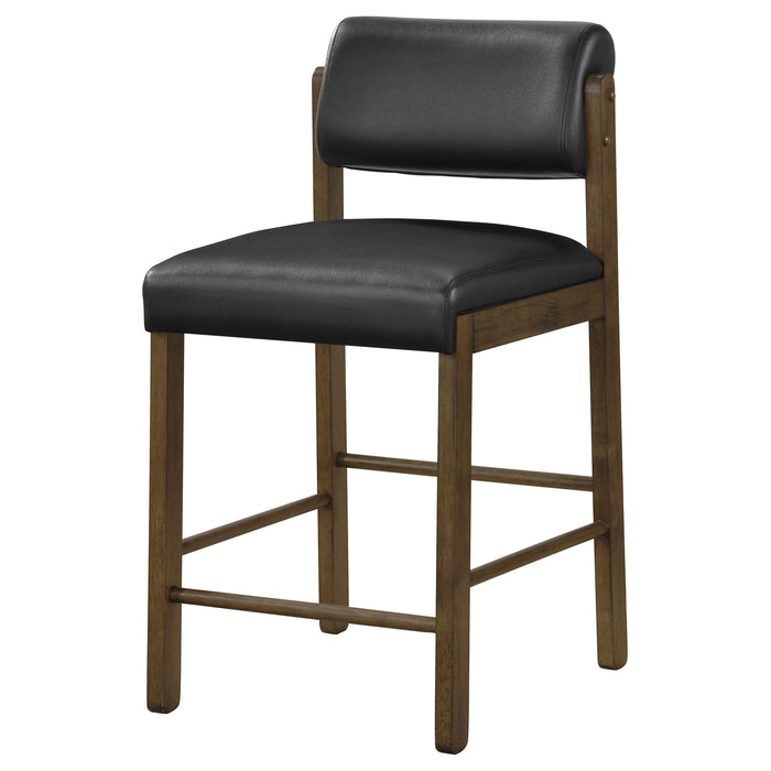 Set of two CoasterEveryday black and walnut upholstered counter height chairs with padded seats and backrests.