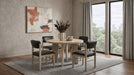 CoasterEveryday 47-inch round wood dining table in natural oak with smooth tabletop and sturdy wooden legs.