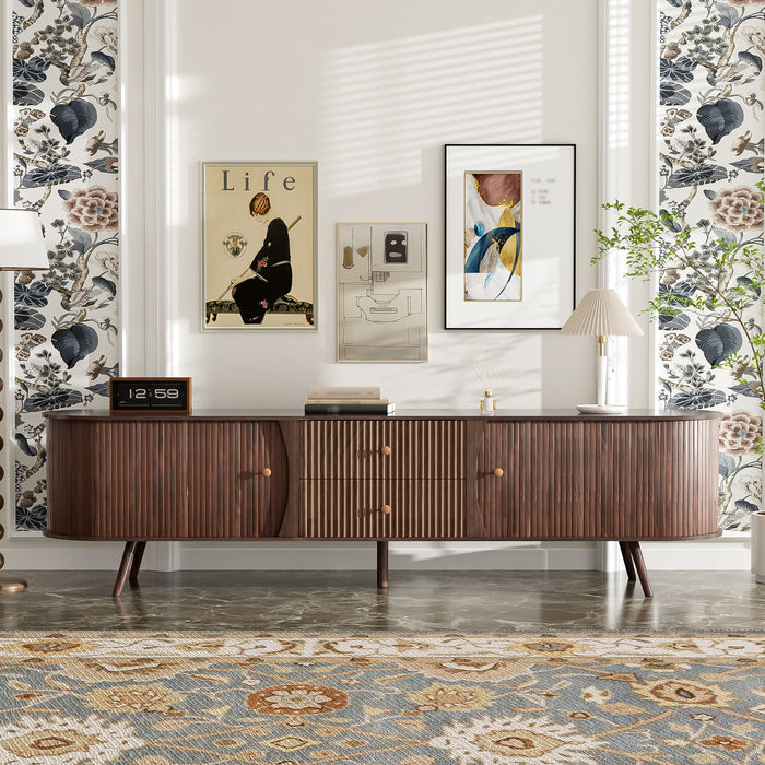 Dark brown Giga 70-inch TV stand with tambour doors and fluted drawers, showcasing a sleek modern design.