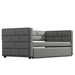 Gray upholstered twin size daybed with padded back and sides, includes trundle bed, by Giga in a modern bedroom setting.