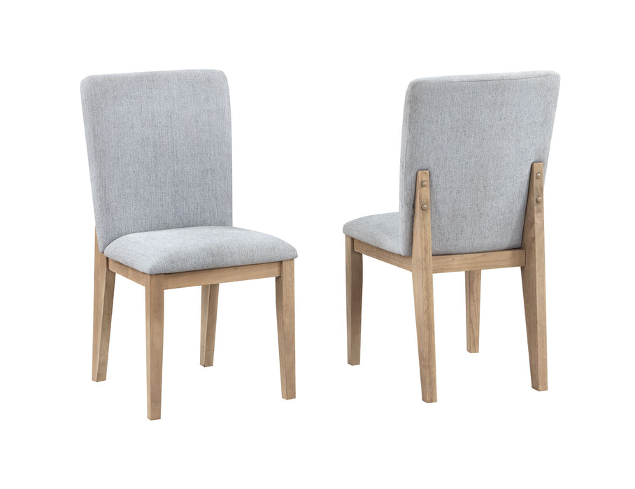 Pair of Giga Caspian Gray dining chairs with oak-finished legs, showcasing modern design and comfortable seating for dining rooms.
