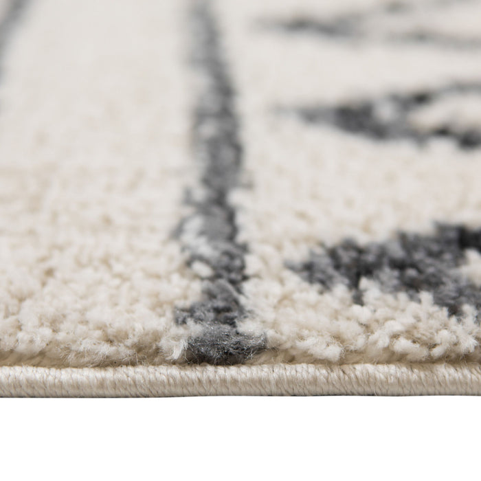 7.5' x 9.5' Geometric Shag Area Rug - Black And Ivory