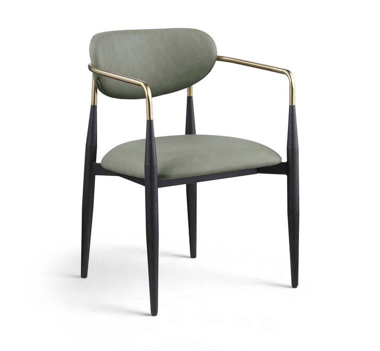 Black-legged Meridian Furniture Ronda vegan leather upholstered dining arm chair with cushioned seat and backrest.