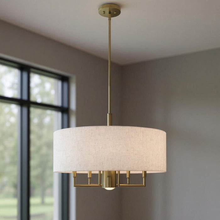 25-inch six-light dimmable chandelier with shades in antiqued brass finish, showcasing elegant lighting design by HomeRoots.