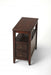 Dark brown manufactured wood end table with two drawers and a shelf, ideal for living room or bedroom decor.