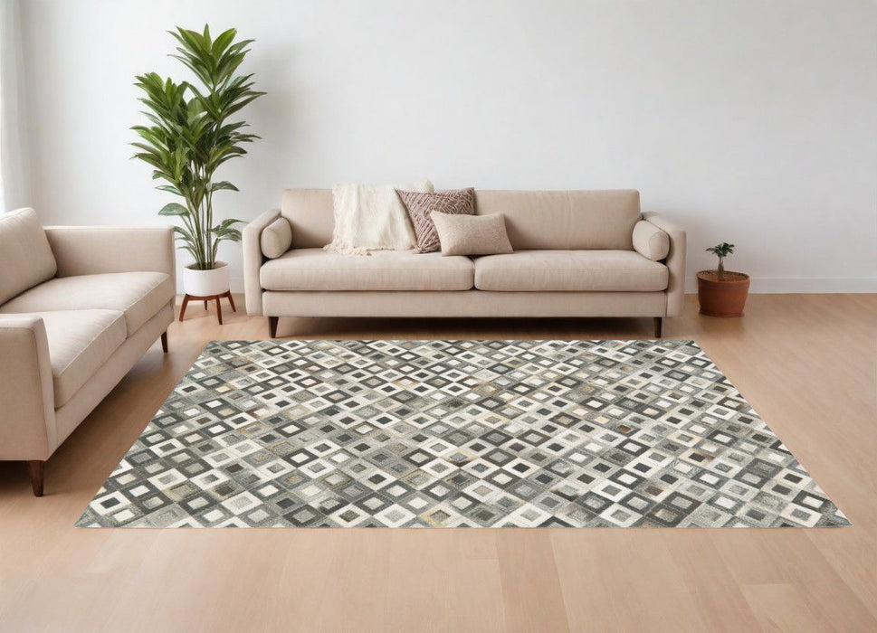 6' x 9' Faux Cowhide Animal Print Power Loom Area Rug - Black Gray And White