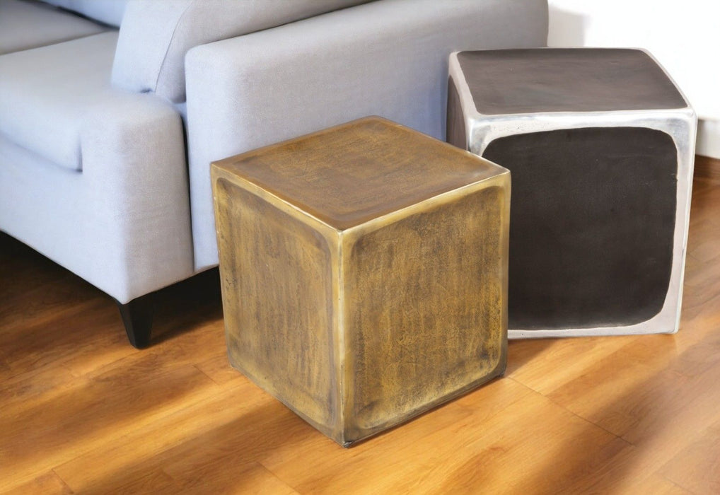 Antiqued aluminum square end tables set by HomeRoots featuring brass finish and modern design for living room decor.