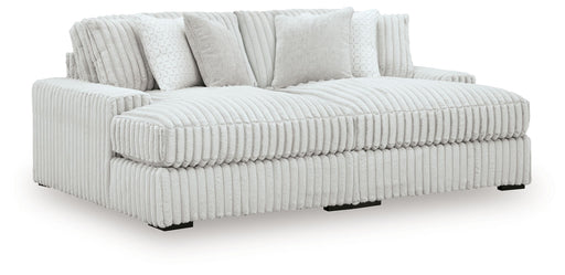 Signature Design by Ashley® Stupendous 2-piece stationary sectional sofa with plush cushions and modern design.