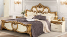 Elegant ivory and gold accent nightstand by ESF with a sleek design and decorative details, perfect for bedroom decor.
