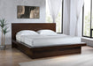 Jessica Wood Eastern King LED Panel Bed in cappuccino finish, showcasing the modern furniture design with LED lighting accents.