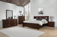 CoasterEssence Jessica Eastern King LED Storage Bookcase Bed in cappuccino with built-in LED lights and spacious storage drawers.