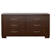 Jessica 4-piece queen bedroom set by CoasterEssence with cappuccino-finished bed frame, nightstands, and dresser showing elegant furniture details.